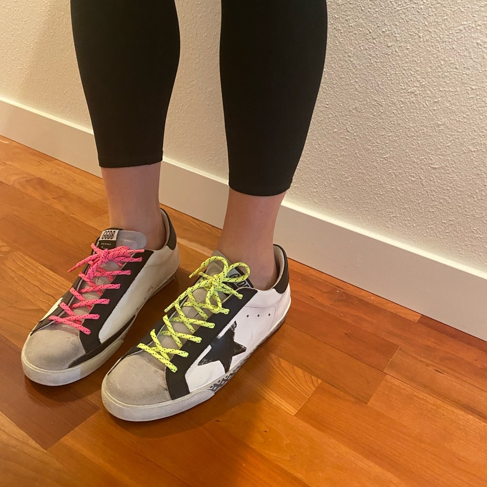 Golden Goose Black and White Retro Sneakers with Star Accents